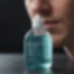 Close-up of mouthwash bottle and dandruff shampoo