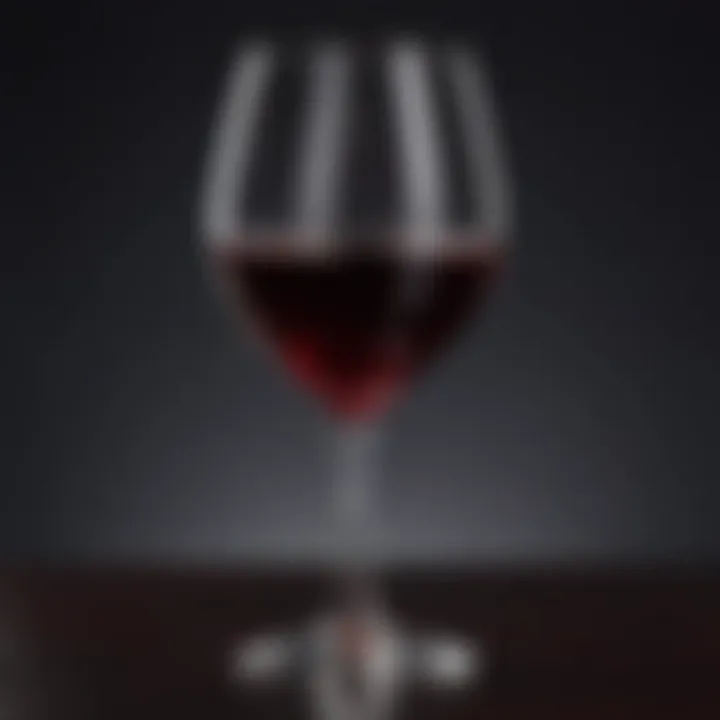 A close-up view of a glass of deep red wine showcasing its rich color and clarity